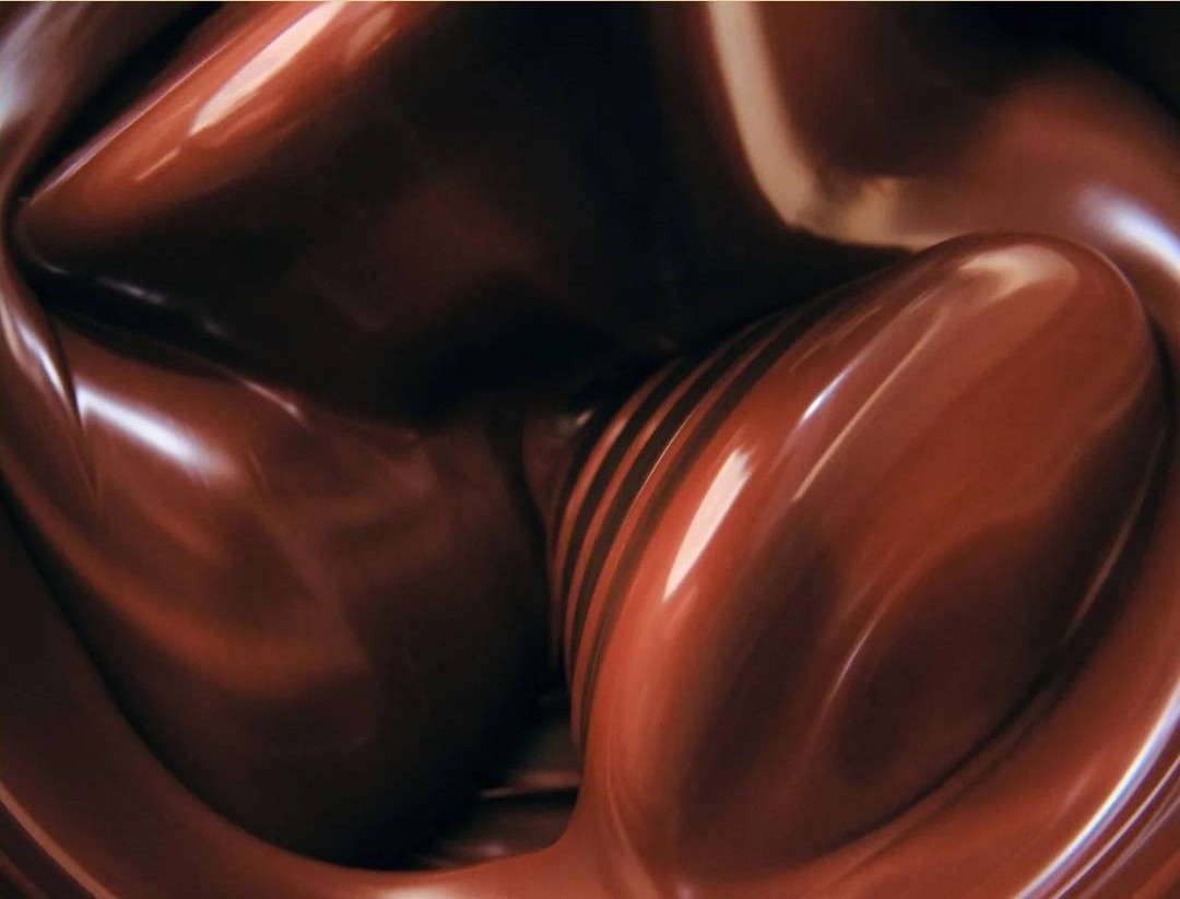 Glossy melted chocolate close-up from the Prafull's Chocolates craft section